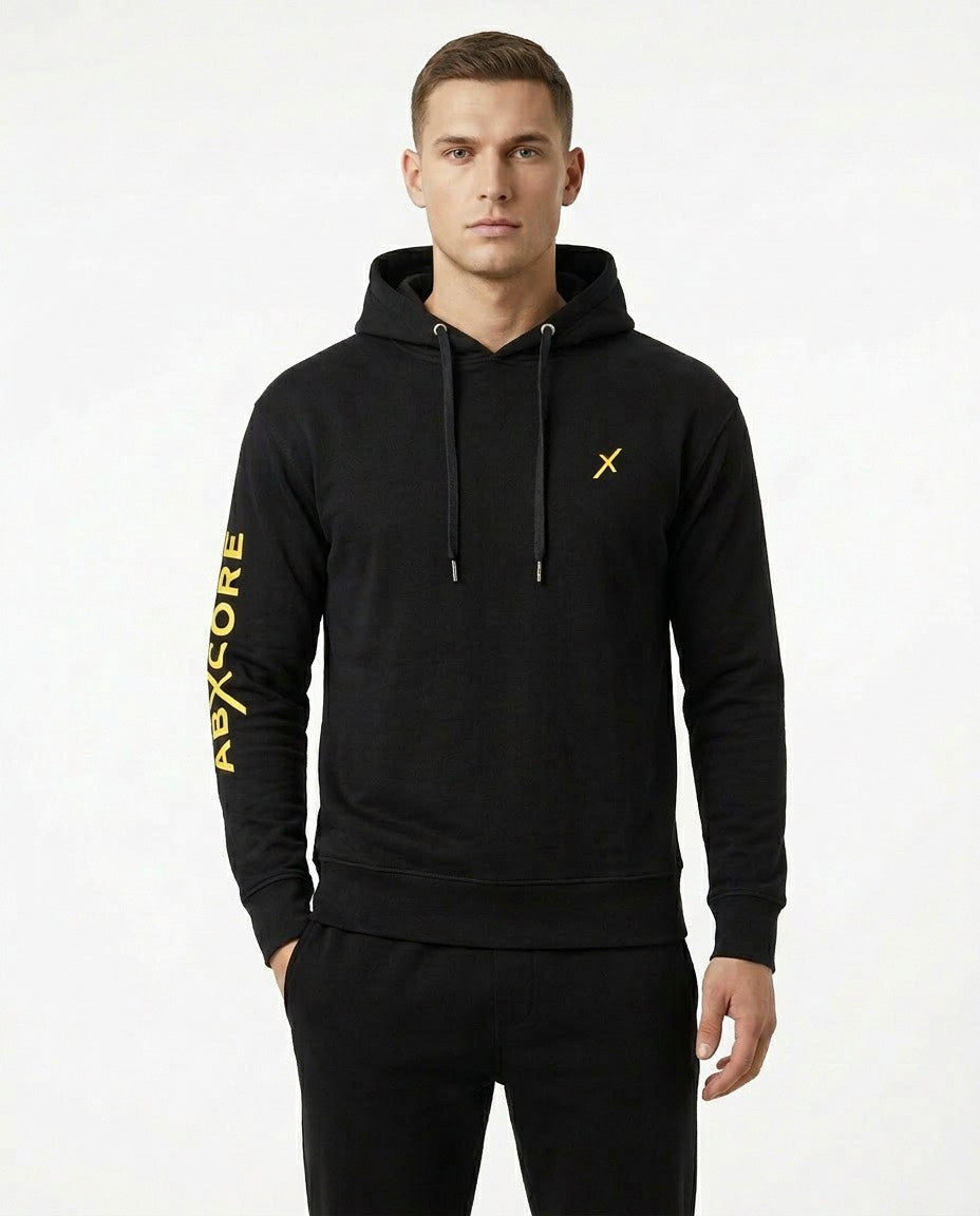 Man wearing AbXcore men’s black hoodie front view
