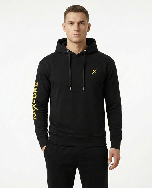 Man wearing AbXcore men’s black hoodie front view