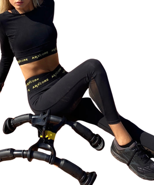 ABXCORE women’s black gym leggings with high waist fit worn during core workout