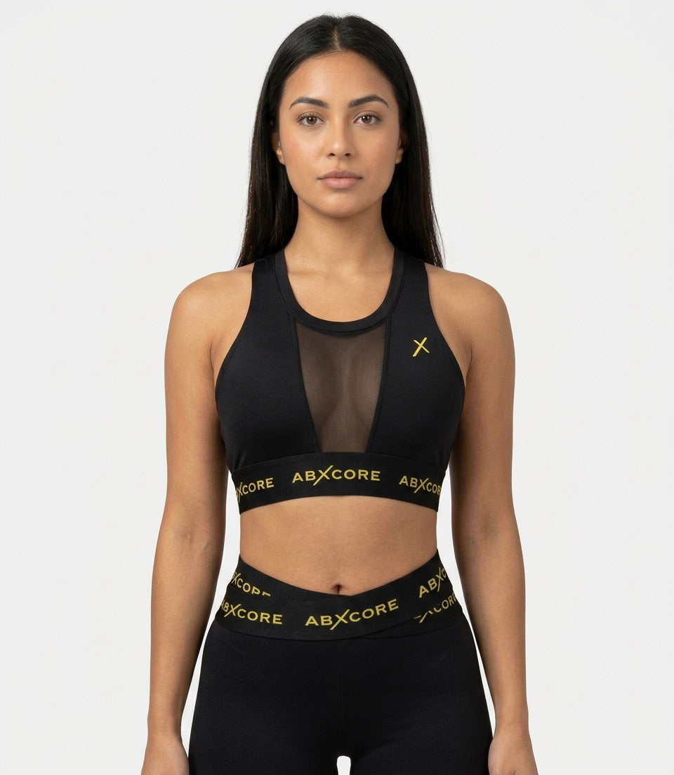 ABXCORE women’s black sports bra with supportive athletic fit
