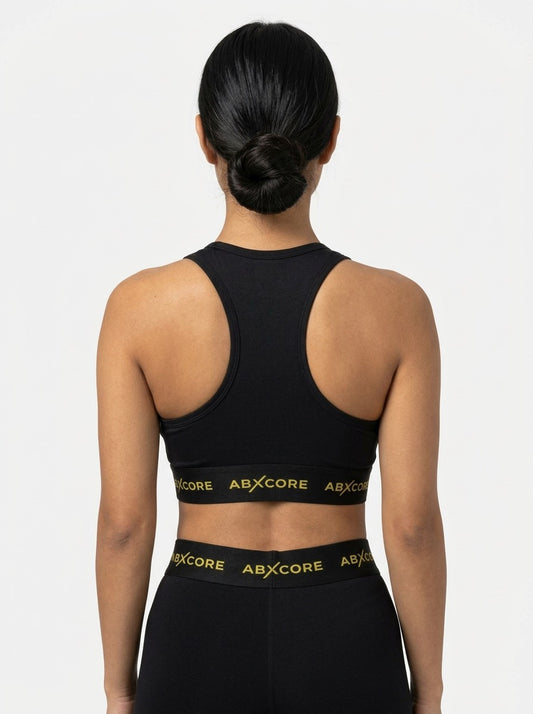 ABXCORE women’s black sports bra with supportive athletic fit