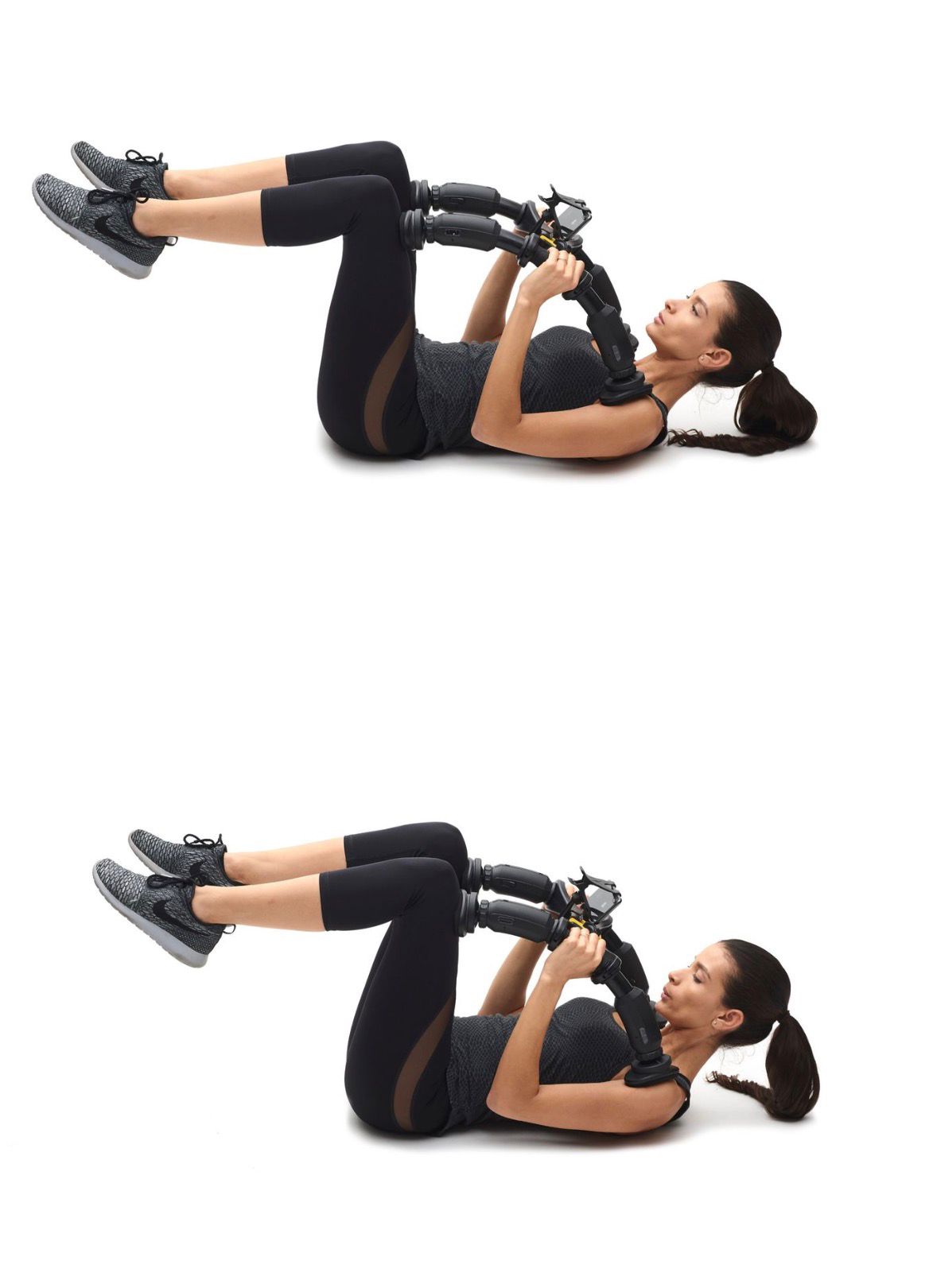 AbXcore woman using the ab device in laying positon 