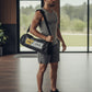 man carying AbXcore gym bag for ab trainer device front view 